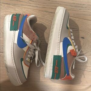 Nike Kids Sneakers in Blue, Green, and Brown